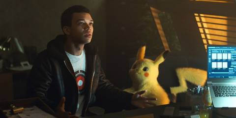 Justice Smith as Tim with Pikachu by his side in Detective Pikachu