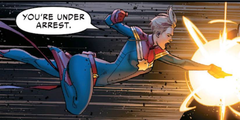 Captain Marvel arresting someone.