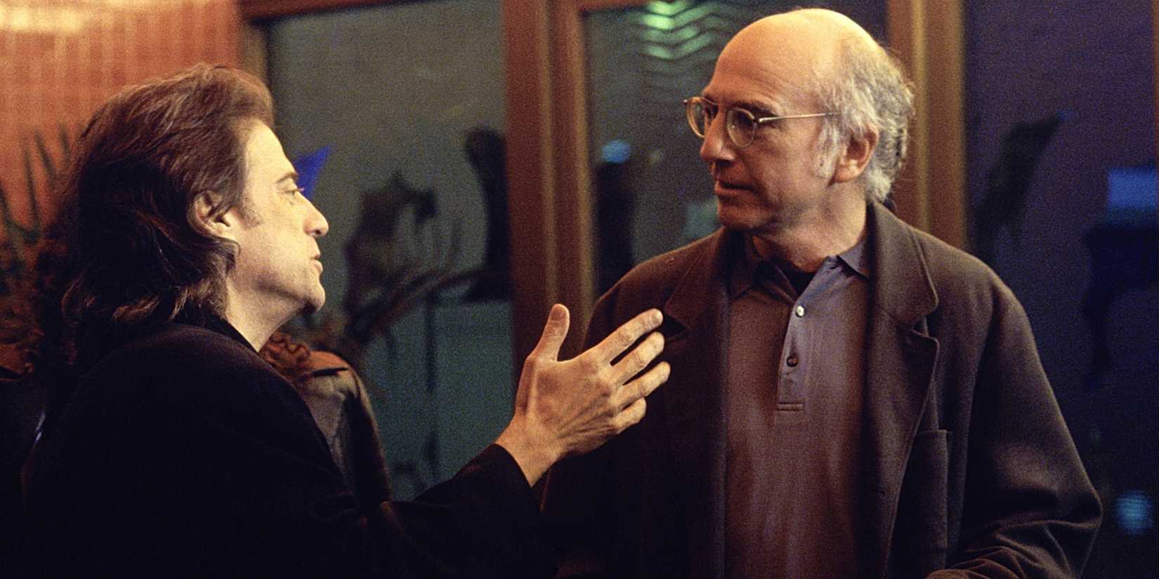 Larry and Richard talk outside a theater in Curb Your Enthusiasm