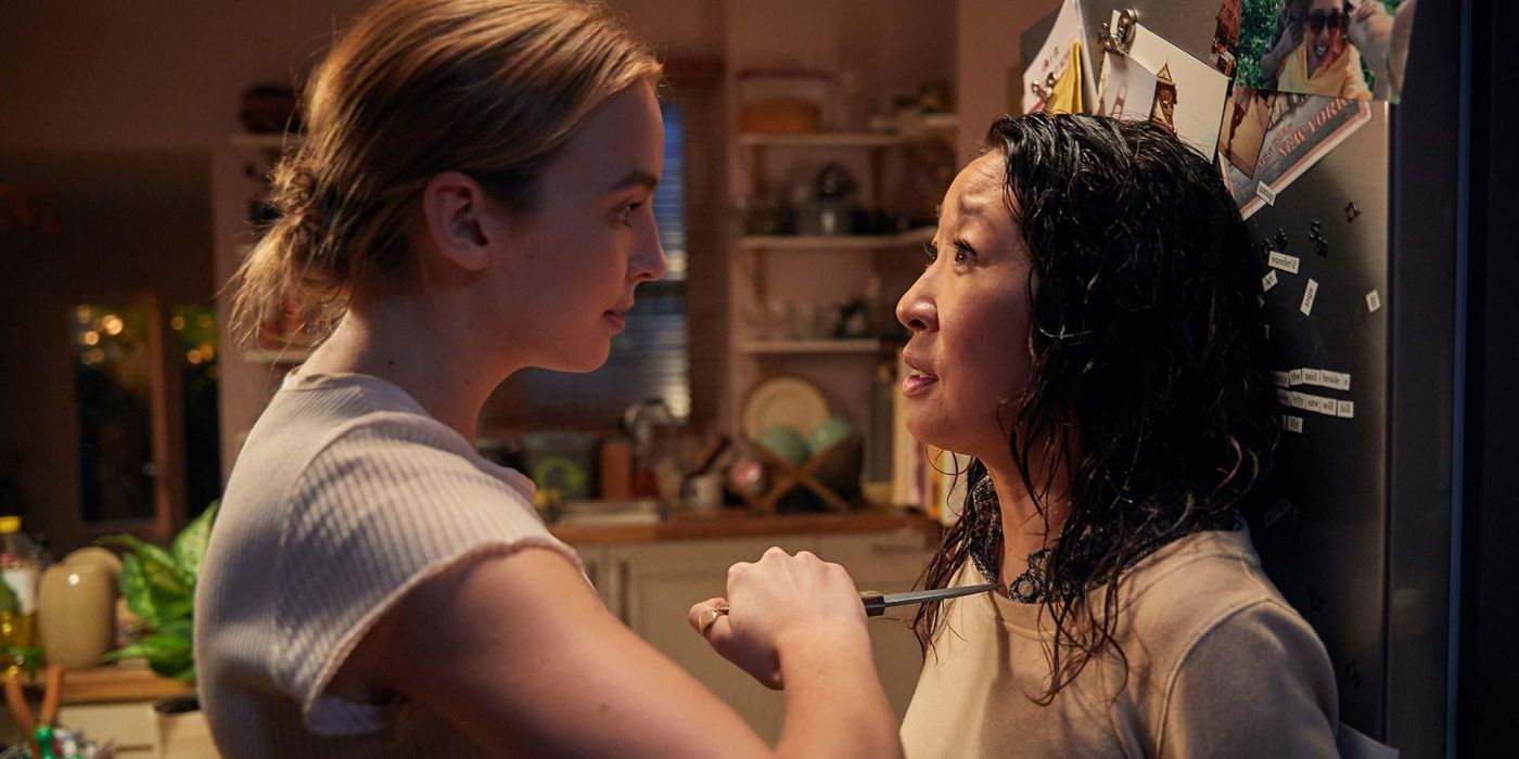 Jodie Comer as Villanelle holding a knife to Eve's (Sandra Oh) throat in Killing Eve