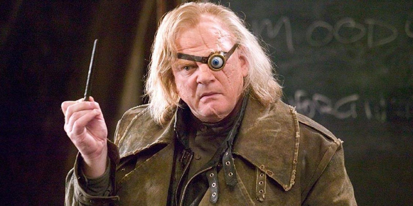 Mad Eye Moody holding a wand