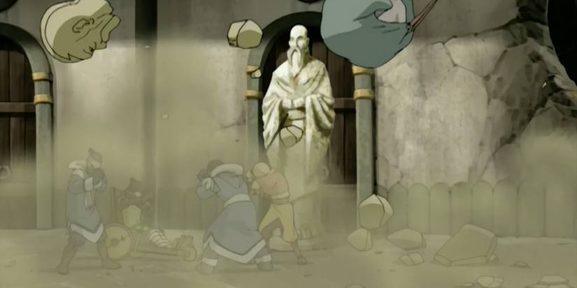 Aang and his friends as a statue collapses near them in Avatar S1E17 The Northern Air Temple
