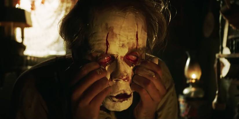 Bill Skarsgard' Pennywise peeling his face paint and skin in IT Chapter 2