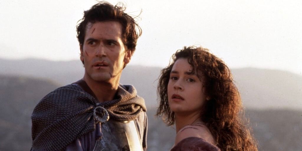 Bruce Campbell and Embeth Davidtz as Ash Williams and Shiela in Army of Darkness