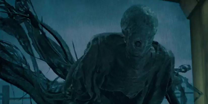 A Dementor about to give the Dementor's kiss to someone in Harry Potter.