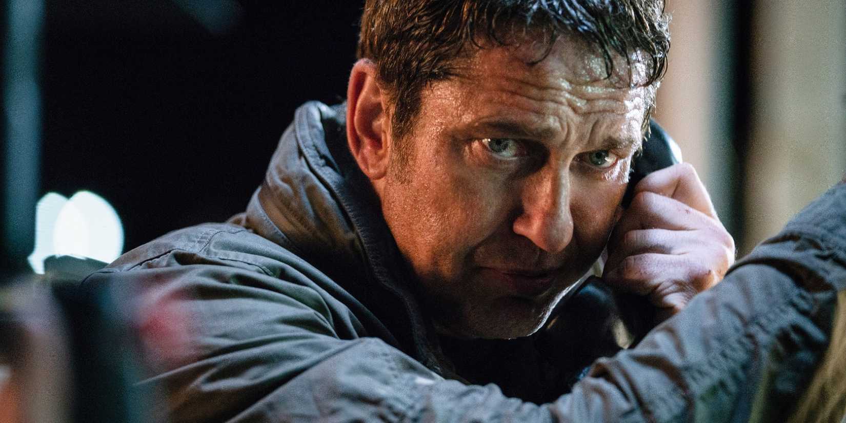 Gerard Butler talking on the phone in Angel Has Fallen 2019