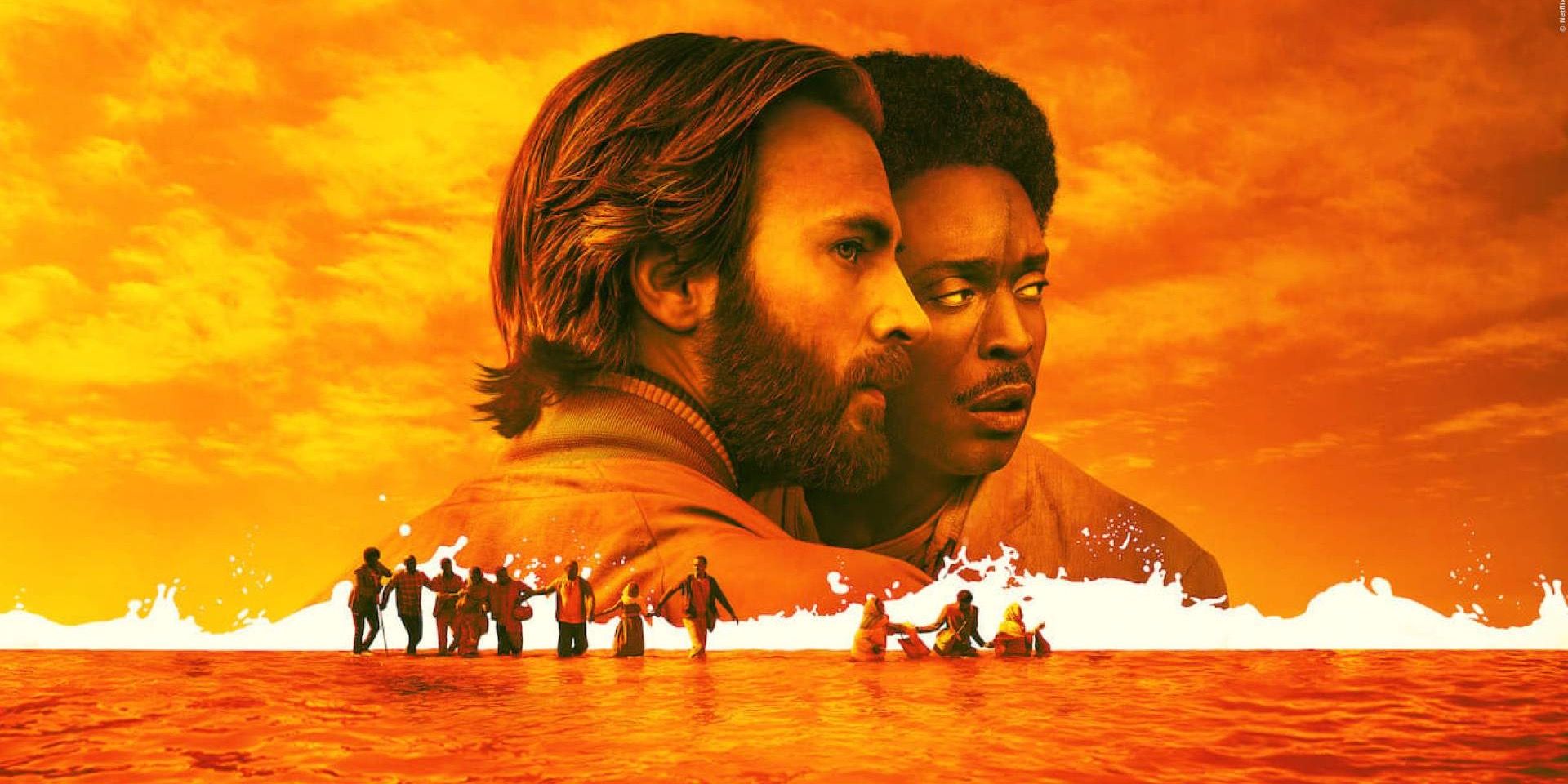 Chris Evans and Michael K. Williams looking sideways on the poster of The Red Sea Diving Resort