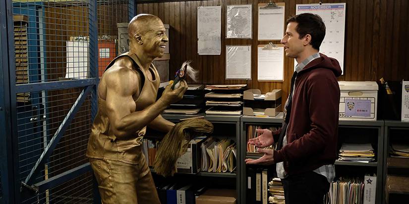 Terry painted in bronze yelling at Jake in Brooklyn Nine Nine