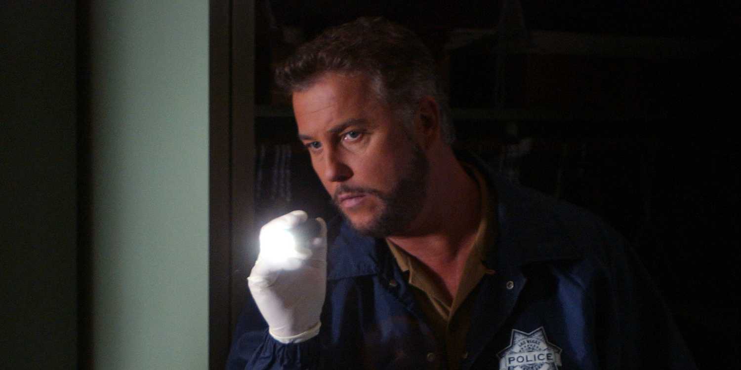 Grissom shining a flashlight in CSI