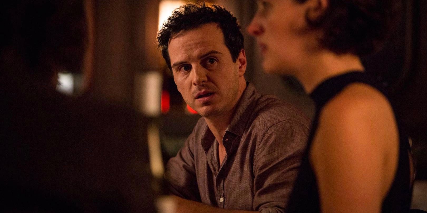 Andrew Scott as The Priest in Fleabag looking at Phoebe Waller-Bridge