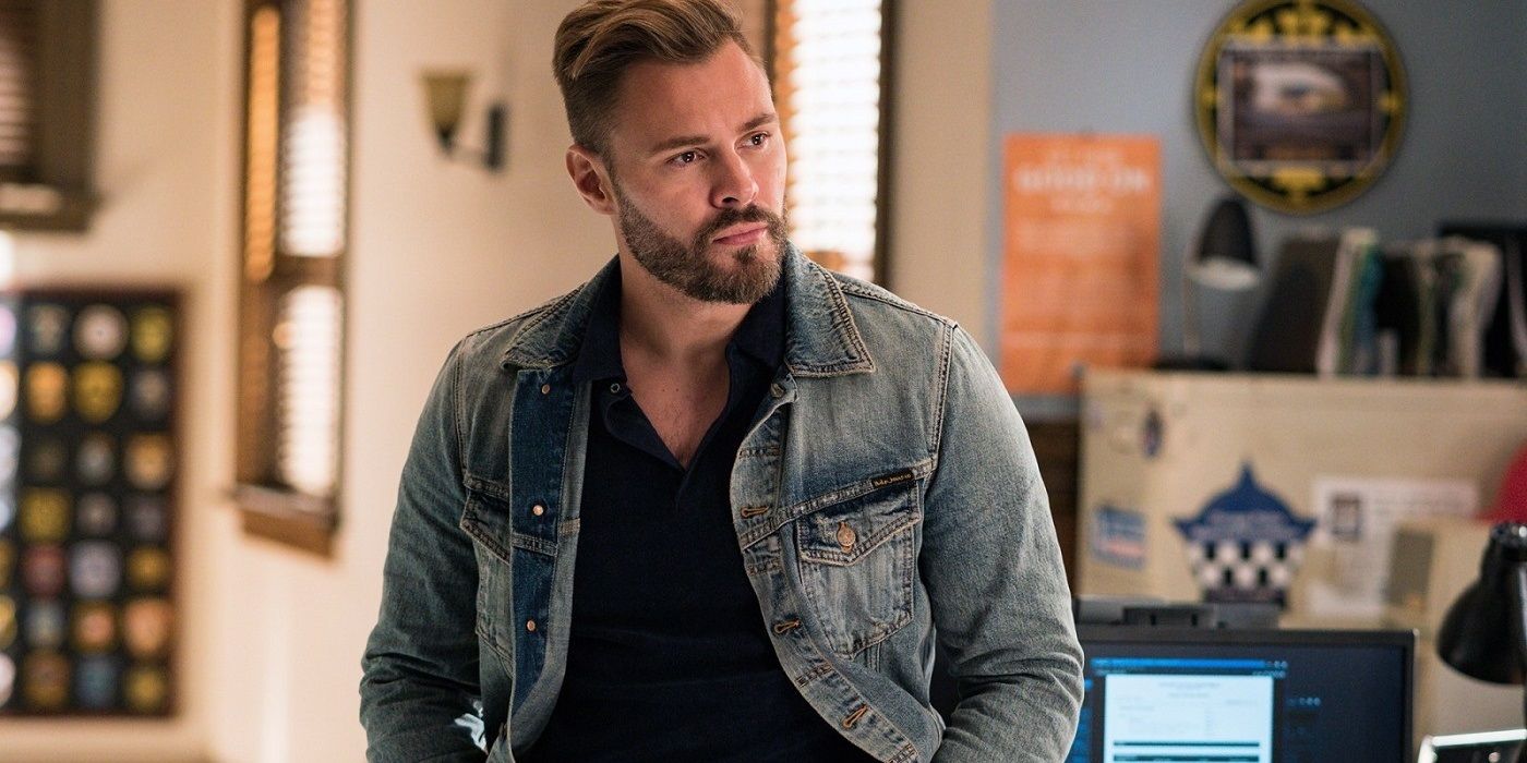 Adam Ruzek (Patrick John Flueger) looking concerned at someone off camera in Chicago PD