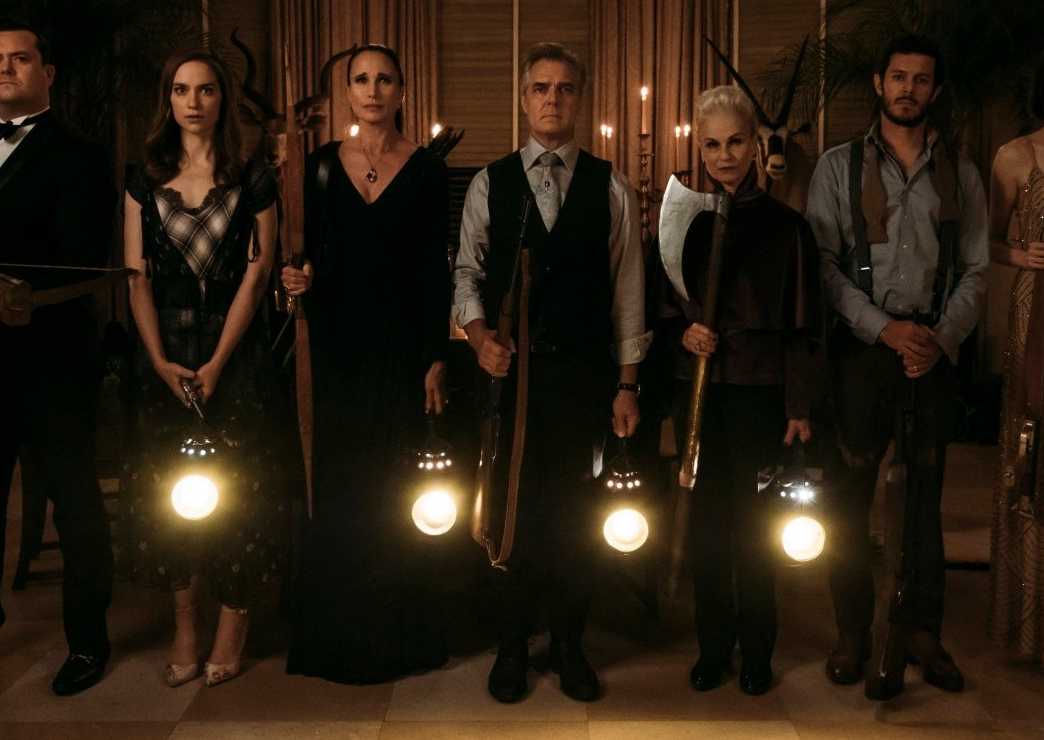 Andie MacDowell, Henry Czerny, Adam Brody, Nicky Guadagni, Elyse Levesque, Kristian Bruun and Melanie Scrofan as the Le Domas family, standing with weapons and lanterns in Ready or Not