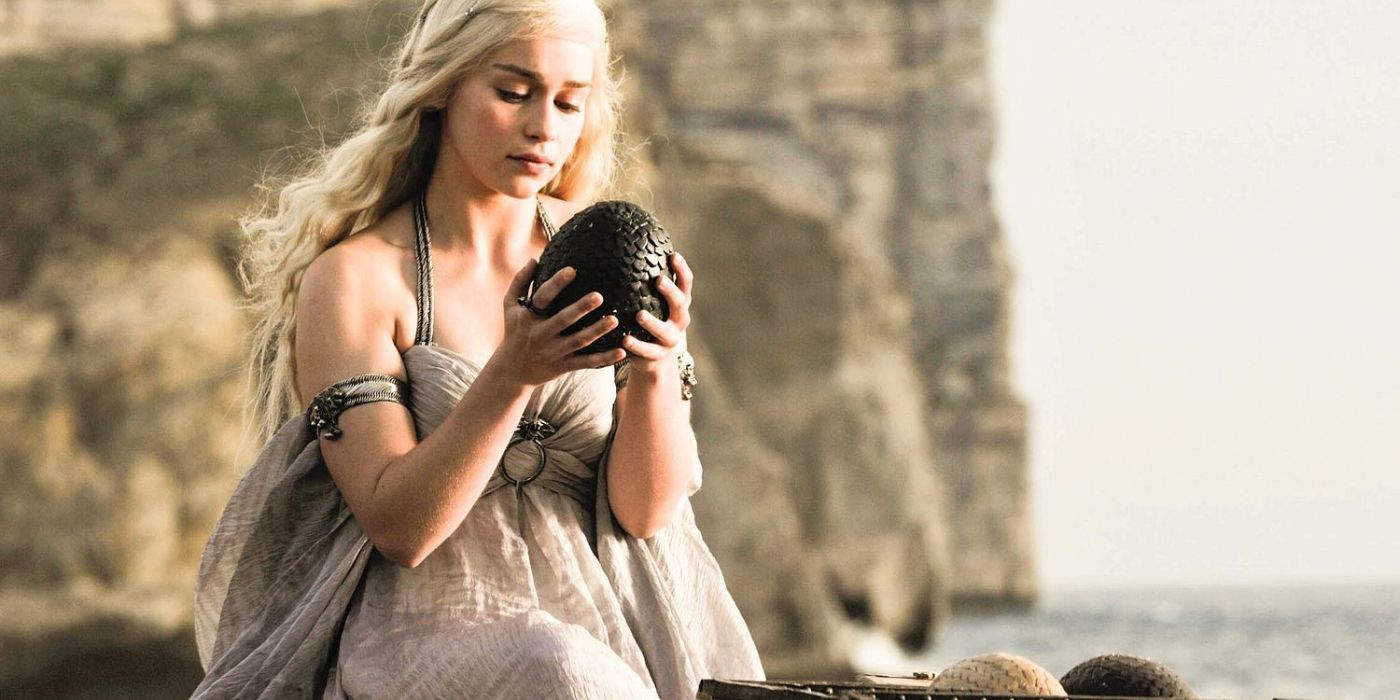 Daenerys (Emilia Clarke) holding a dragon egg in Game of Thrones season 1