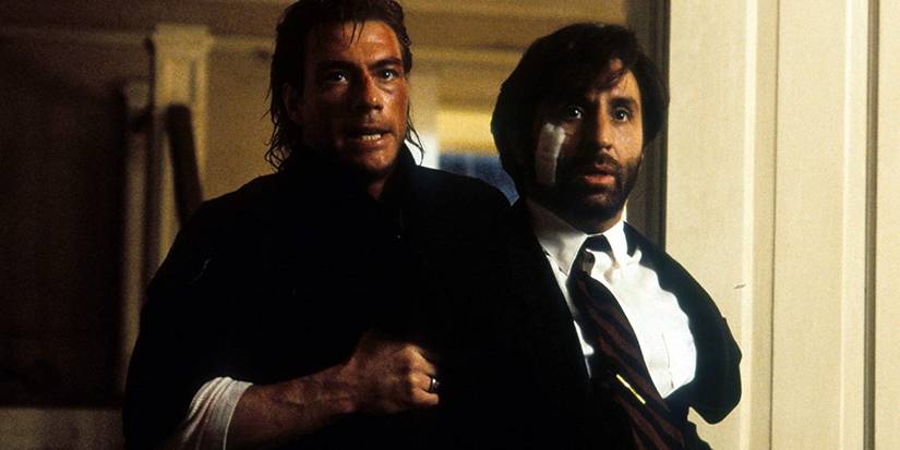 Jean-Claude as Max Walker holding a hostage in Timecop