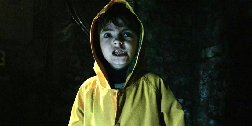Jackson Robert Scott in a yellow rain slicker in It.