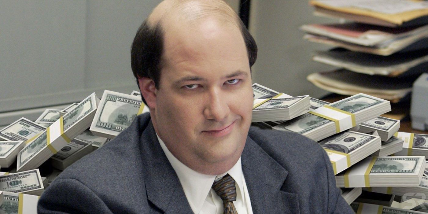 Kevin Malone in The Office with cash in the background