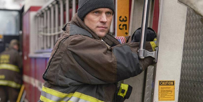 Matt Casey riding on the firetruck.