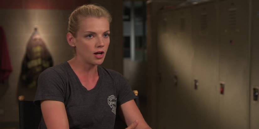 Sylvie talking to someone in Chicago Fire