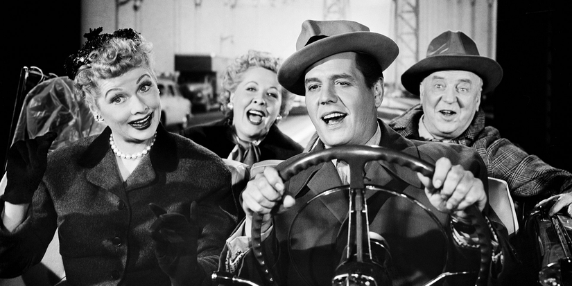 Ricky and Lucy in a car.