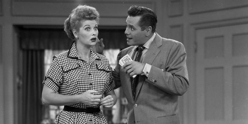 Lucy looking shocked as she talks to Ricky Ricardo on I Love Lucy.