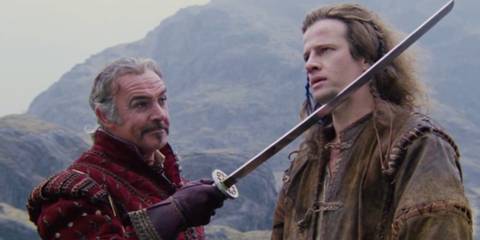Sean Connery holds a sword to Christopher Lambert's neck in Highlander.