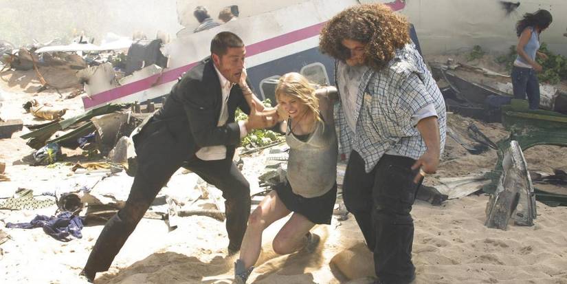 Jack and Hurley help Claire to her feet in Lost pilot