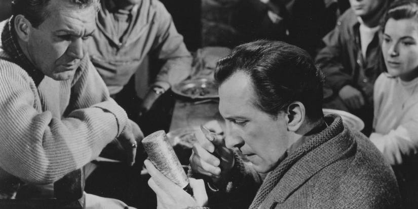 Peter Cushing investigating an artifact in The Abominable Snowman
