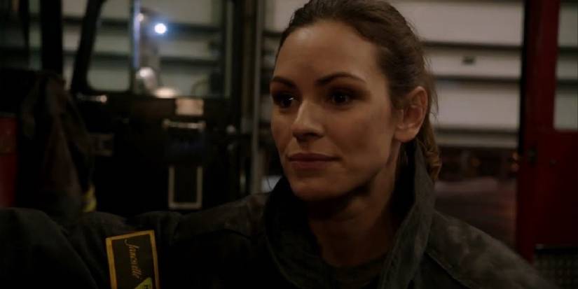 Rebecca Jones standing outside the firetruck in Chicago Fire