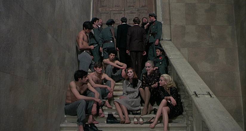 Salo or 120 days of sodom people hanging out by a door