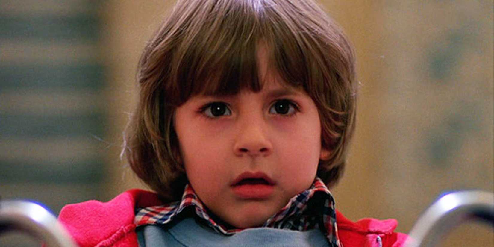 Danny riding his tricycle in The Shining