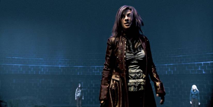 Nymphadora Tonks standing ready to fight in Harry Potter.