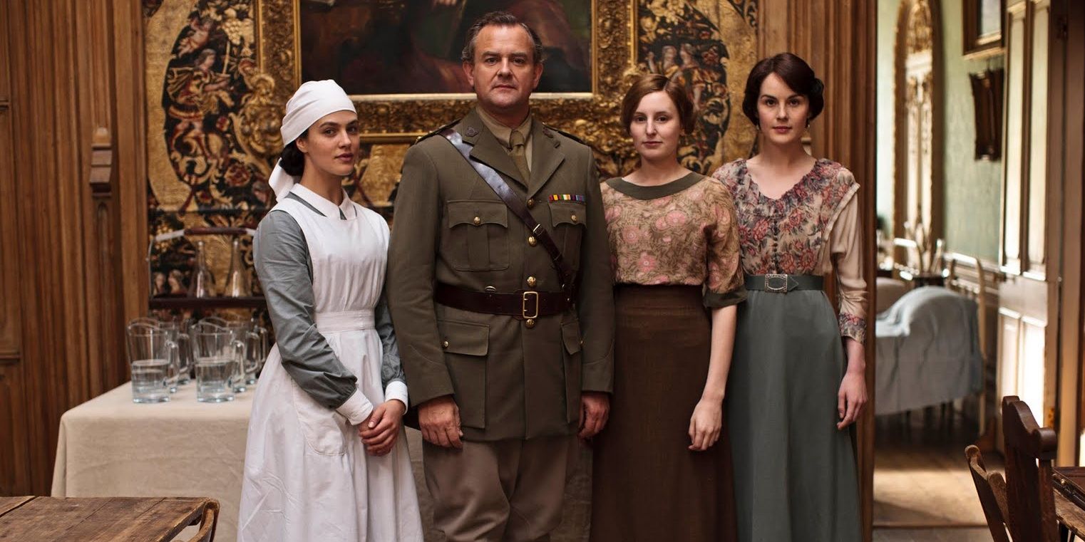 Sybil, Robert, Edith, and Mary stood together at Downton Abbey