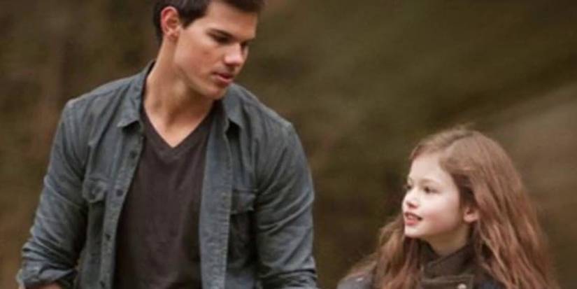 Jacob walking with Renesmee in Breaking Dawn