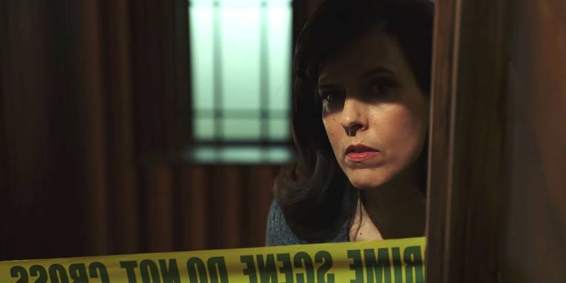 Fran behind crime scene tape in Knives Out