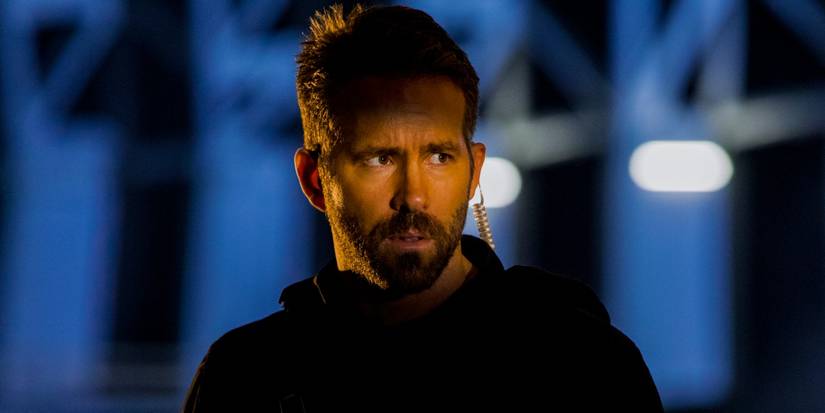 Ryan Reynolds standing in the shadows in 6 Underground