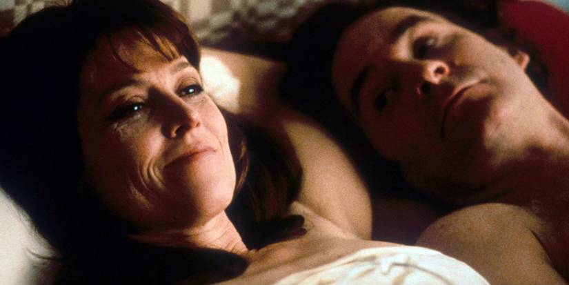 Signourney Weaver and Kevin Kline in in bed together in The Ice Storm