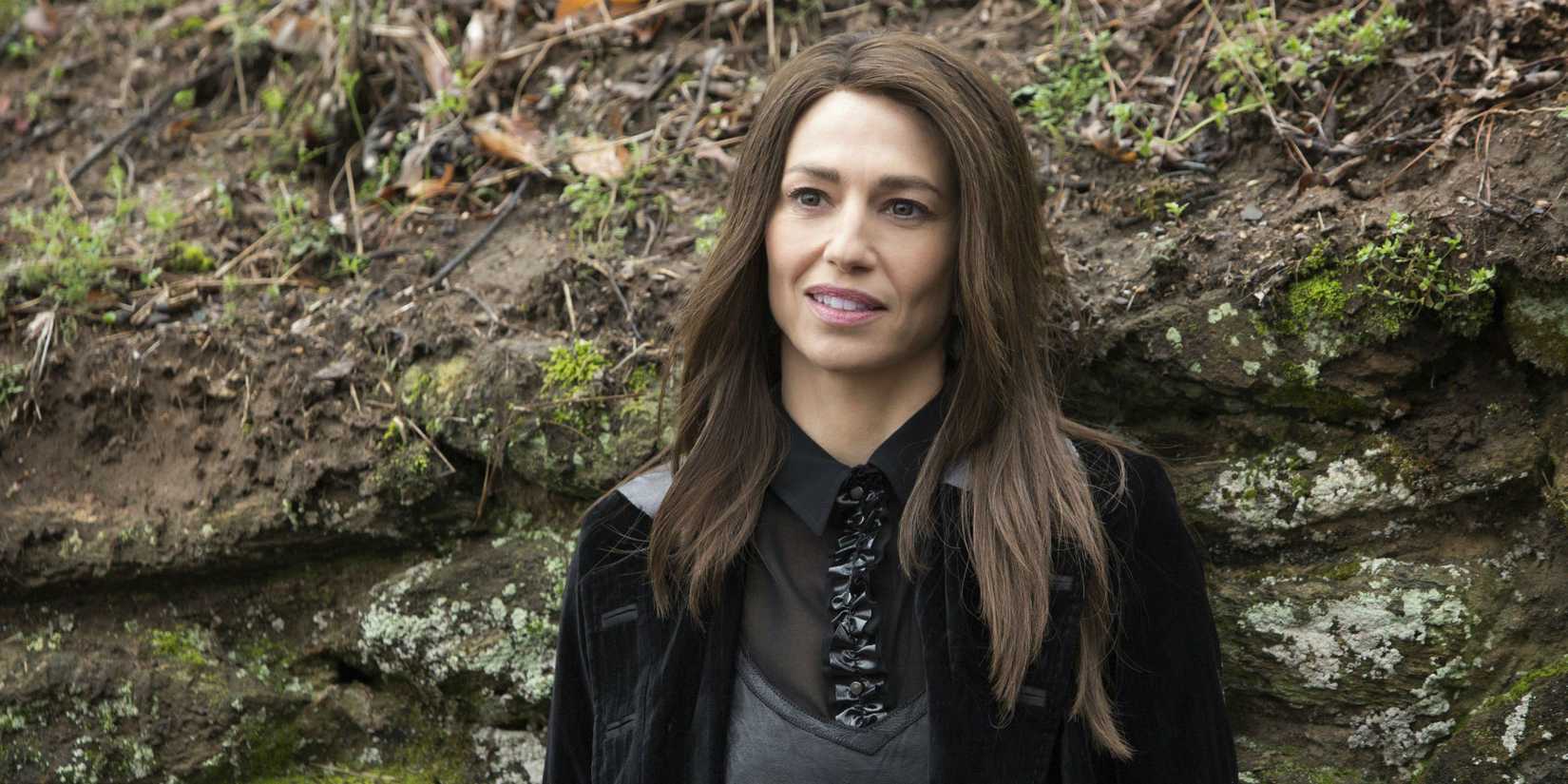 Aunt Dahlia grins in