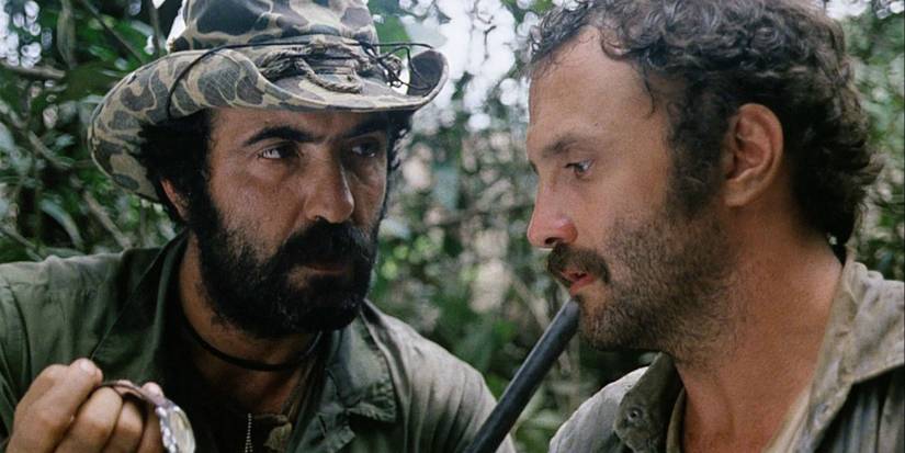 Two men talk in Cannibal Holocaust 