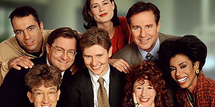 NewsRadio cast smiling and looking at the camera.