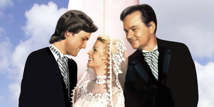 Bob Crane smiles as Kathleen Cody and Kurt Russell loot at one another in wedding attire in Superdad