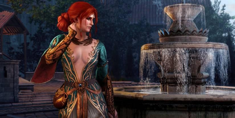 Triss' alternate outfit, a green dress with gold trim, in The Witcher 3 