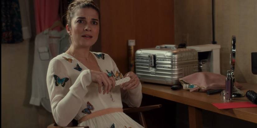 alexis red dress schitts creek Alexis in Maid of Honour (6x04) Dress: @reformation ($136) Shoes: @dsquared2 ($1,110) 'A' Necklace: @anthropologie