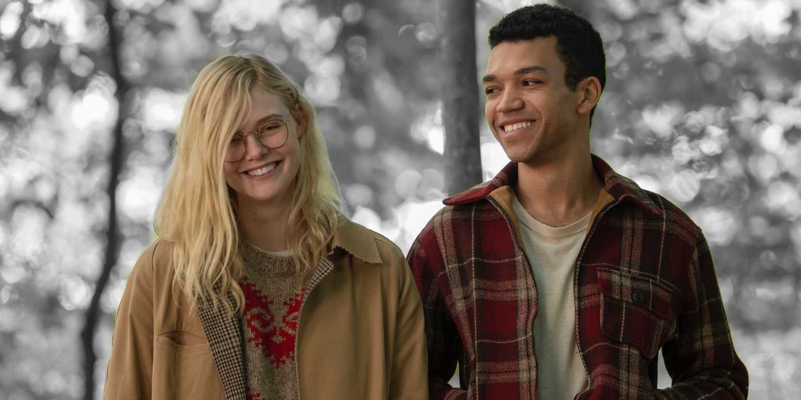 Elle Fanning and Justice Smith as Violet and Theo smiling and looking at each other in All The Bright Places