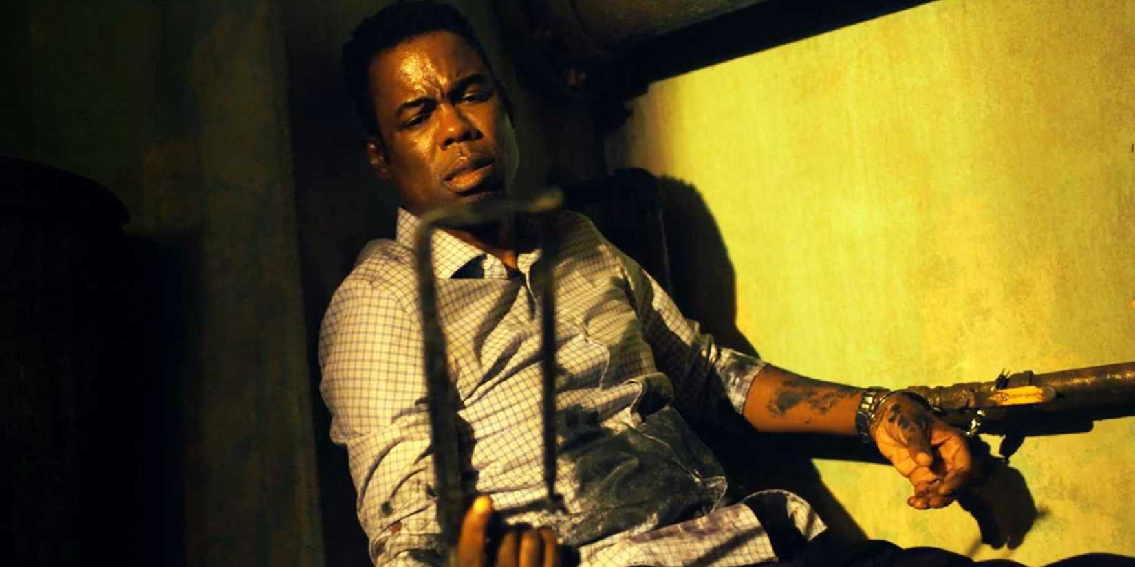 Chris Rock como o Detetive Zeke Banks em Spiral: Do Livro de Jogos Mortais