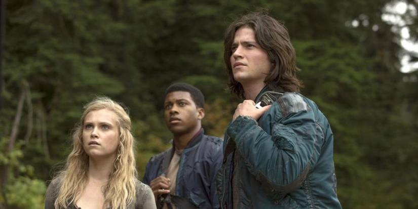 The 100 Eliza Taylor as Clarke, Eli Goree as Wells, Thomas McDonell as Finn
