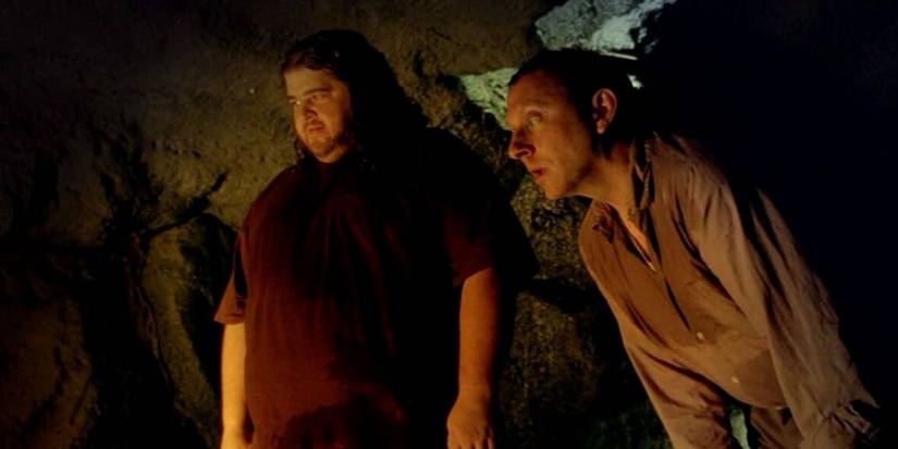 Hurley e Ben olhando para o Coração da Ilha sendo restaurado em Lost