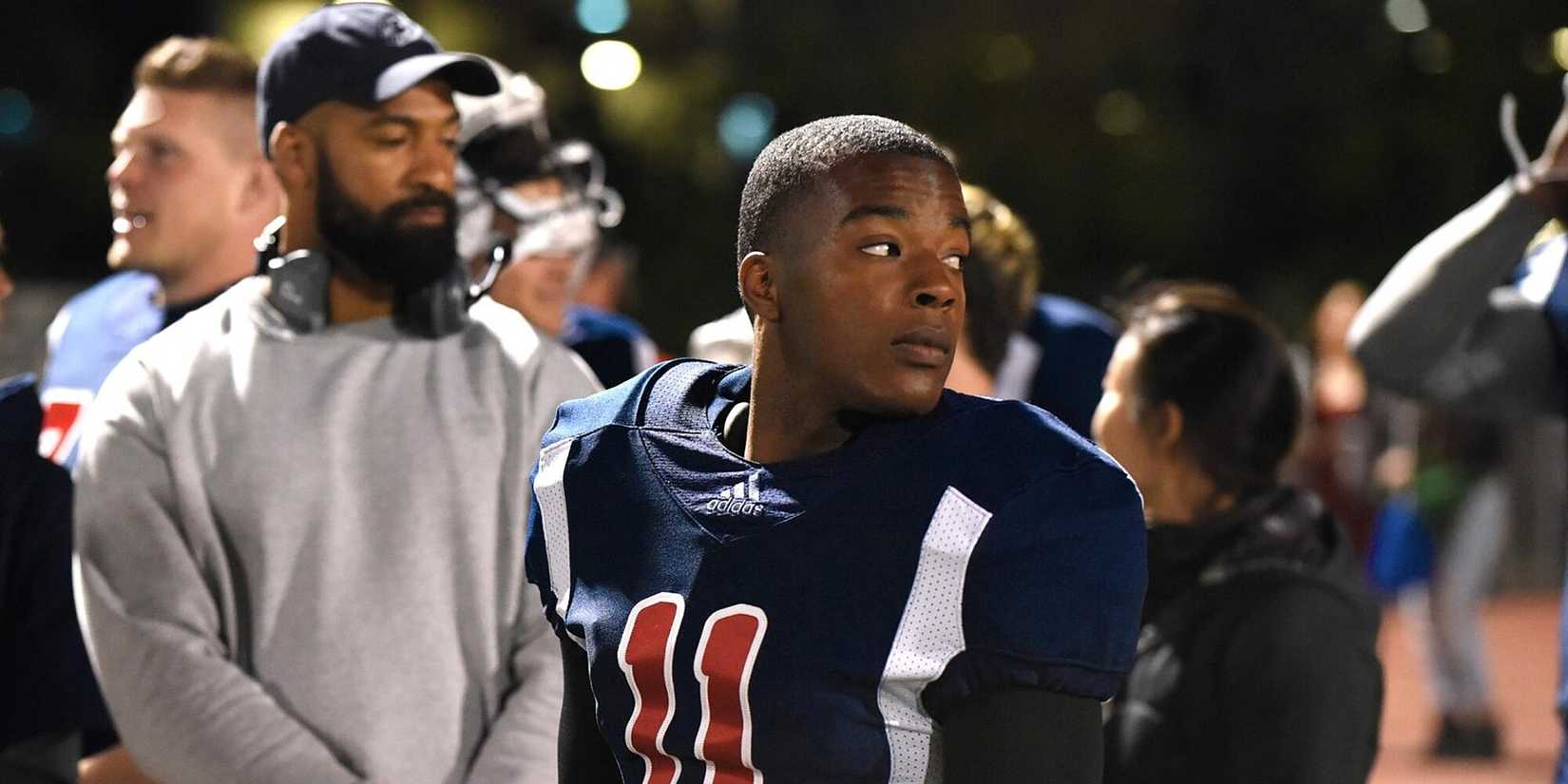 Spencer James on the football field on All American.