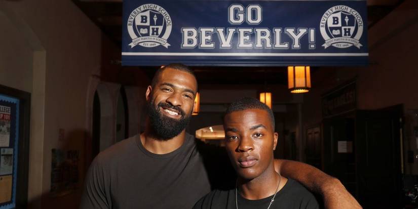 Spencer Paysinger posing with All American actor Daniel Ezra.