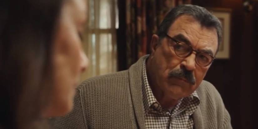 Tom Selleck in Blue Bloods talking with a woman