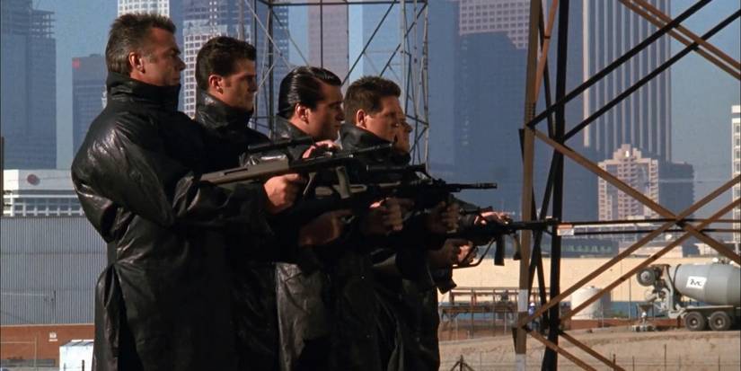 A group of men dressed in leather jackets with guns in Harley Davidson And The Marlboro Man